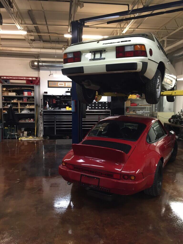 Red Porsche under a ramp